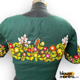 3067 	Bottle Green Khadi Cotton | Flower Embroidery on Centre 	Glass Sleeve